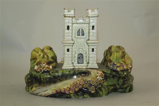 A rare Staffordshire pearlware model of a castle tower or hunting lodge, c.1820, 13.5cm